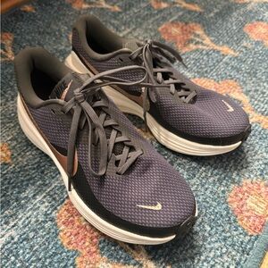 Nike Women’s grey and rose gold Athletic Shoes